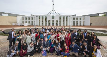 Australia Awards Scholars gathered in front of the Parliament House in Canberra for the Scholars Forum
