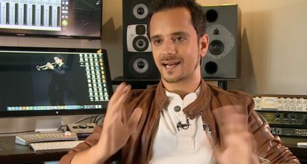 Raghav Sachar speaking in a music recording studio